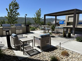 Rooftop terrace with grilling stations and pergola